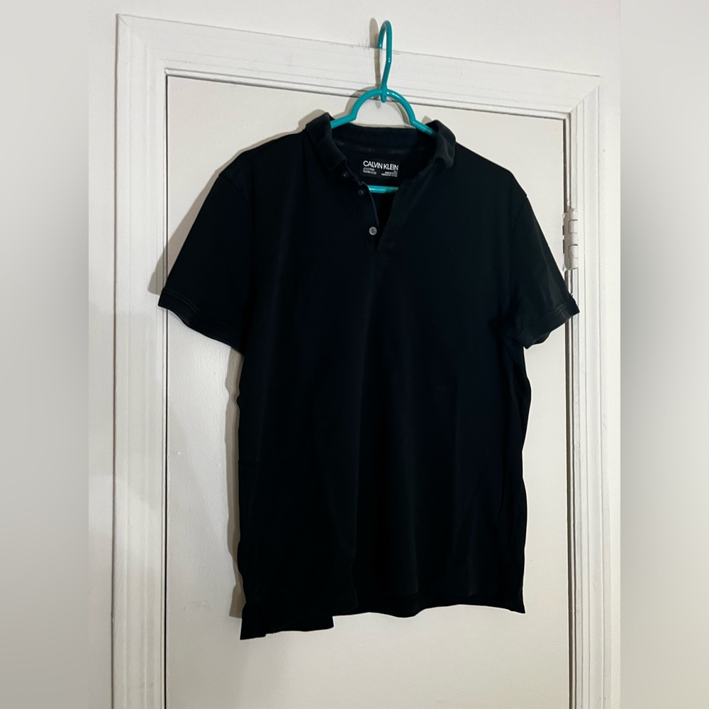 Calvin Klein Black Polo Short Sleeve
Size Large
In great condition